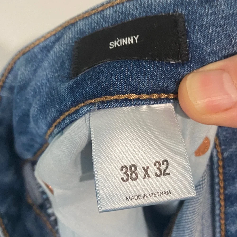 Express Distressed Blue Skinny Jeans. Size 38x 32